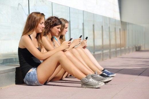 teenage-girls-with-phones.jpg